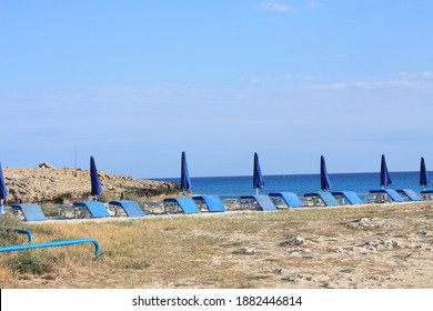 Umbrellas And Sunbeds On Aya Napa