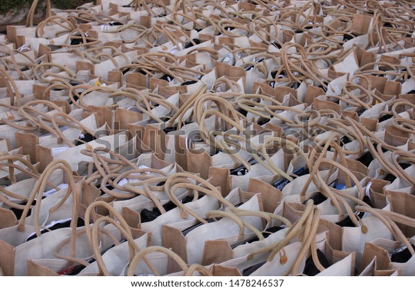 Umm Al Quwain, UAE - February 15, 2019: A closeup\
shot of goody bags lined up for participants of the Khaleej Times\
Desert Drive held on February 15, 2019 in Umm Al Quwain, United\
Arab Emirates (UAE)