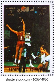 UMM AL-QUWAIN - CIRCA 1972: a stamp printed in the Umm al-Quwain shows Basketball, Summer Olympics, Munich 1972, circa 1972