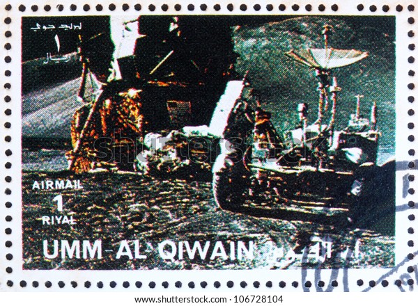 UMM AL-QUWAIN - CIRCA 1972: a stamp printed in the\
Umm al-Quwain shows Astronaut, Moon Rover and Lunar Module,\
Moon-landing, Apollo, circa\
1972