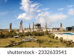 Umm Al-Tabbul Mosque In Baghdad Iraq with beautiful cloud blue sky