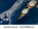 Umnak Island. Landsat caught a rare glimpse of the thirdlargest Aleutian Island. Elements of this image furnished by NASA.