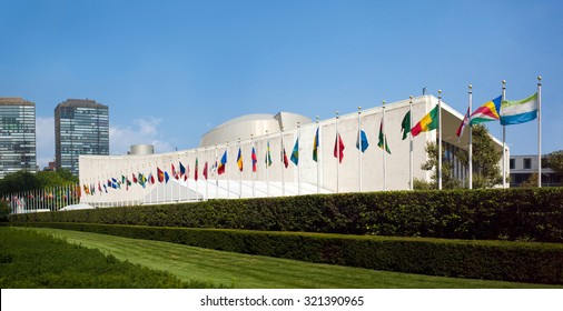 UN United Nations General Assembly Building With World Flags Flying In Front - First Avenue, New York City, NY, USA