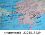 Unalakleet on political map of globe, travel concept, selective focus, background