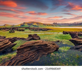 Unbelievable Icelandic landscape on the south coast of Iceland on Atlantic coast. Spectacular summer sunset with volcanic ground. Beauty of nature concept background.