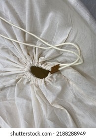 Unbleached Cotton Textile Cord Ties The Sack In The Laundry Basket. Linen Drawstring Bag. Canvas Sack Or Laundry Basket