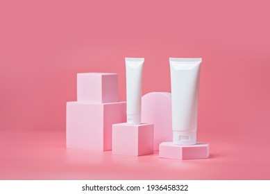 Unbranded Blank Cosmetics Packages On A Pedestal. Skincare Female Products Advertising