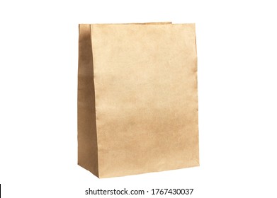 Unbranded Kraft Package. Place For Creative Design Or Text. Boxing For Contactless Product Delivery. Mockup Style And Blank Space On Paper Bag. Package And Shipping Concept. Isolated On White