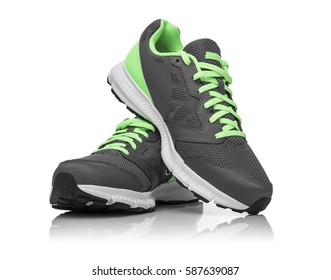 white and lime green shoes