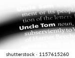 uncle tom word in a dictionary. uncle tom concept.