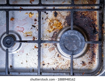 Unclean Gas Stove, Steel Kitchen Cooktop, Old Fat Stains, Fry Spots, Oil Splatters And Burned-on Bits, Top View 