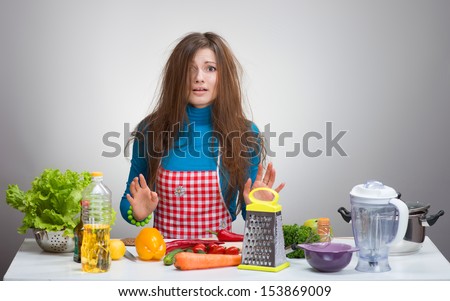Uncombed depressive woman in the kitchen 
