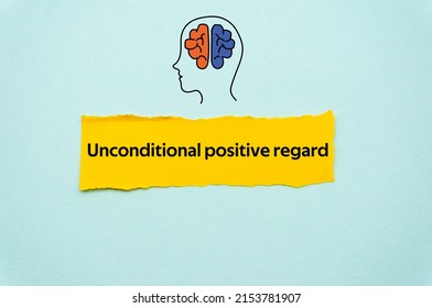 Unconditional positive regard.The word is written on a slip of colored paper. Psychological terms, psychologic words, Spiritual terminology. psychiatric research. Mental Health Buzzwords. - Shutterstock ID 2153781907