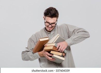 Unconfident Handsome Student In Glasses Droping Books