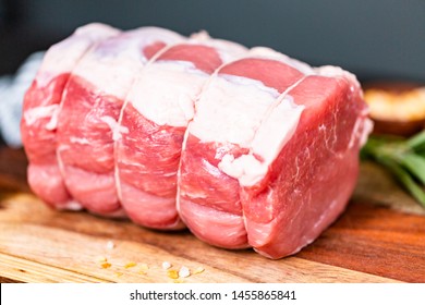 Uncooked Boneless Pork Roast On The Cutting Board.