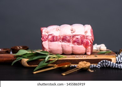 Uncooked Boneless Pork Roast On The Cutting Board.