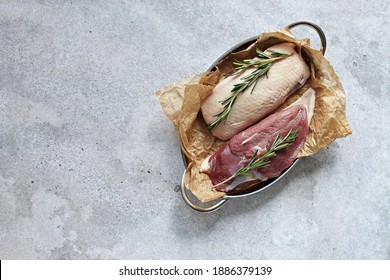 Uncooked Duck Breast With Herbs And Spices . Overhead View. Copy Space