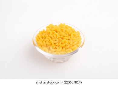 Uncooked Elbow Macaroni In A Clear Glass Bowl