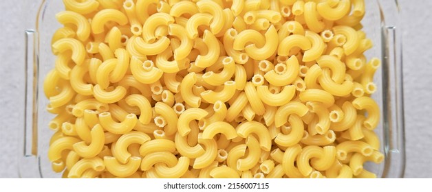 Uncooked Elbow Macaroni Pasta Background