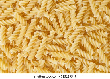 Uncooked Fusilli Pasta Background