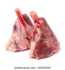 Uncooked Goat Meat Leg Shank Roasting Joints Isolated On A White Studio Background