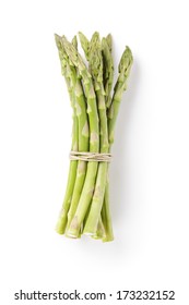 uncooked green asparagus tied with twine from above, isolated on white