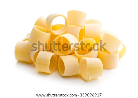 uncooked pasta calamarata on white background