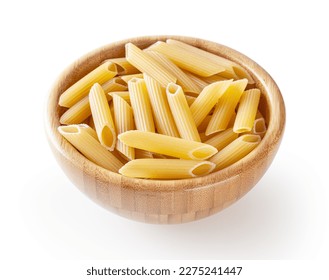 Uncooked penne pasta in wooden bowl isolated on white background with clipping path - Powered by Shutterstock