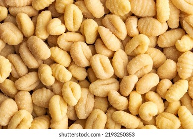 Uncooked potato gnocchi. Tasty italian food. Top view. - Shutterstock ID 2193250353