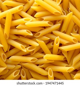 Uncooked Raw Organic Penne Pasta, Overhead View.