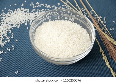Uncooked rice in elegance blue background 