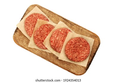 Uncooked Round Patties For Grilling From Ground Beef And Pork. Raw Minced Steak Burgers From Beef And Pork Meat Isolated On White Background, Overhead View. Homemade Burgers For BBQ Grill, Top View.