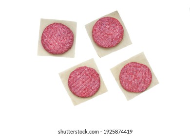 Uncooked Round Patties For Grilling From Ground Beef And Pork. Homemade Burgers For BBQ Grill, Top View. Raw Minced Steak Burgers From Beef And Pork Meat Isolated On White Background, Overhead View. 