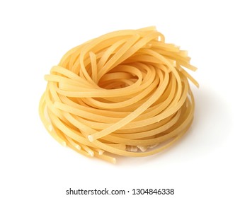 Uncooked tagliolini pasta nest isolated on white - Powered by Shutterstock