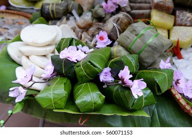 Uncooked Vietnamese Chung Cake isolated. It's a square glutinous sticky rice cake, stuffed with pork meat, green beans and wrapped in bamboo leaf. Traditional Vietnamese New Year (Tet) food.