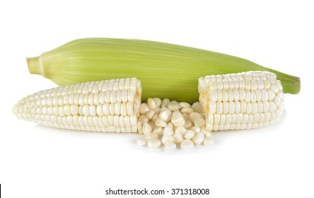 uncooked white corn with leaf on white background