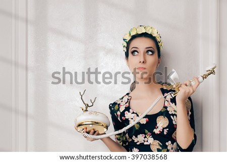 Undecided Retro Woman Ready With Vintage Phone - Young woman talking on a classic embellished telephone