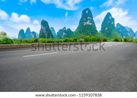 Under the blue sky road surface and landscape scenery