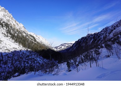 Under The Blue Sky A White Snow Valley In An Alpine Climate, The Tatra Mountains