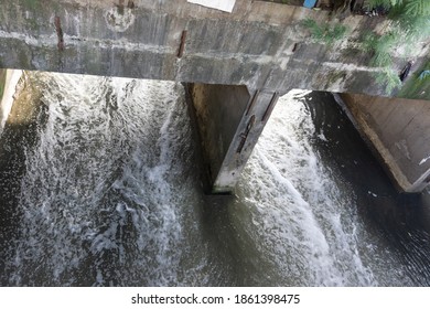 Under the bridge the river flows fast