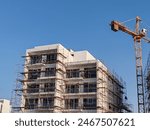 Under construction residential building with Concreate Block or bricks structure. Exterior view of highrise under construction building with modern design, under construction skyscraper, G+8 building.