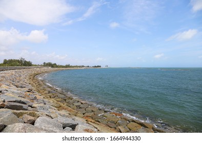 Under Construction Of Rubber Mound  Offshore  Breakwater Work For Wave Protection Or Shoreline Beach Erosion Control.Rock Revetment :Coastal Engineering Structure:Thailand