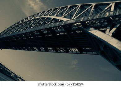 Under The Hell Gate Bridge In Dark Vintage Style, New York