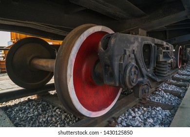 Under The Train. Super Wide Angle, Perspective Lines. Railway Background. Freight Train, Railroad Theme. Transporting System, Cargo Service. Set Of Wheels. High Speed Train. Travel And Adventures 