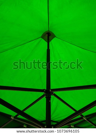 Under view of old umbrella green