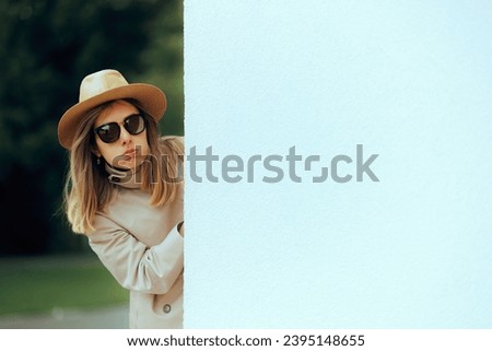 
Undercover Woman Wearing Hat and Sunglasses Spying. Jealous girlfriend in disguise stalking her boyfriend from afar

