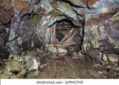 Underground Abandoned Platinum Ore Mine Tunnel With Collapsed Wooden Timbering