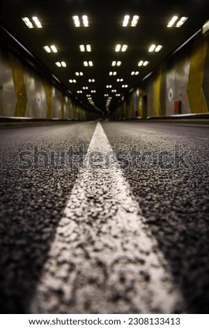 Underground car passage completely empty with no traffic