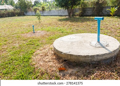 Underground Cement Cylinder Of Lavatory Cesspit In Lawn Yard