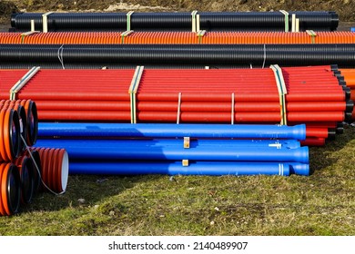 underground communication plastic pipes of different colors and diameters